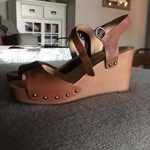 Brown wedge sandals with nailhead detail